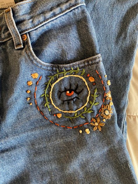 Diy, sewing, hippie embroidery, embroidery doodles, jeans, clothes embroidery, jean’s embroidery Easy Jeans Embroidery, Embroidery Designs Y2k, How To Embroider Jeans, Hand Embroidered Jeans, Embroidery Jeans Diy Easy, Jeans Embroidery Diy, Male Housewife, Embroidery Inspiration Jeans, Doodle Jeans