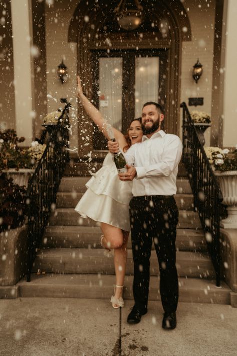 city elopement ideas, city hall wedding, city engagement session, short wedding dress, elopement ideas, city hall wedding outfit, city hall wedding dress, city hall wedding photos, elopement photography, city wedding, long wedding dress, city wedding photos, champagne pop Elopment Photoshoot Ideas City, Champagne Pop Engagement Photos, Wedding Photos Champagne, Champagne Popping Pictures, Champagne Engagement Pictures, City Hall Wedding Outfit, Wedding Dress City Hall, Engagement Photos Champagne, Engagement Photos Formal