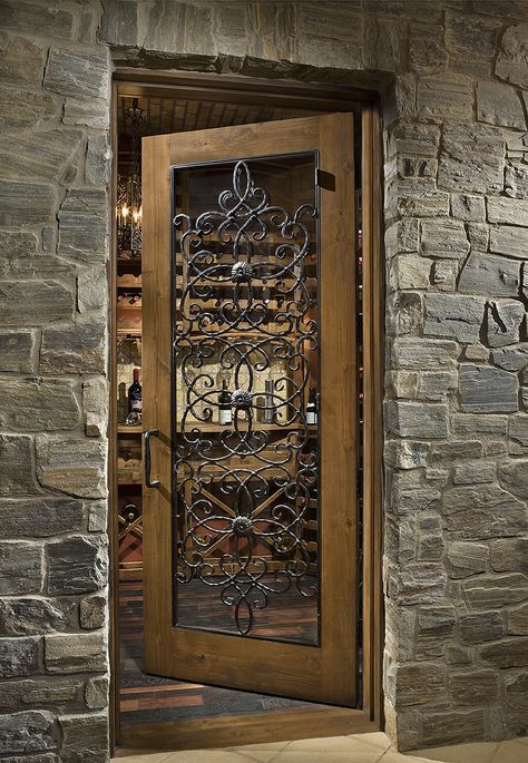 Custom wood wine cellar door with glass and iron work. Wood And Iron Door, Wine Doors, Wood Wine Cellar, Wine Door, Under Stairs Wine Cellar, Bourbon Room, Wine Cellar Basement, Wine Cellar Door, Home Wine Cellars