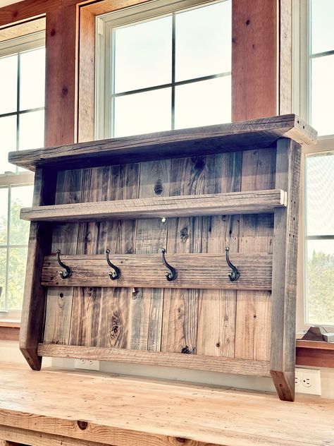 "Beautiful solid barnwood 4-hook hat/coat rack to hang on the wall of an entry, mudroom, garage, hallway!  Dimensions: 34\"H x 37-3/4\"Lx 7-3/4\"D FREE LOCAL PICKUP- SHIPPING CHARGE WILL BE REFUNDED." Coat Rack Wall Entryway, Small Woodworking Shop Ideas, Wall Hangers For Clothes, Pallet Coat Racks, Woodworking Items That Sell, Mudroom Remodel, Rustic Farmhouse Furniture, Old Wood Doors, Hall Trees