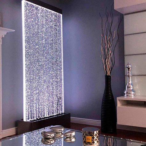 11 Zen Water Feature Ideas for Indoors  ||  From tabletop water features to full-on indoor ponds, there are plenty of ways to add some Zen to your home. https://www.familyhandyman.com/diy-advice/zen-water-feature-ideas-for-indoors/ Spa Feature Wall, Office Water Feature, Modern Feature Wall Design, Water Feature Wall Indoor, Waterwalls Indoor, Interior Water Feature, Indoor Water Wall, Water Feature Indoor, Water Feature Ideas