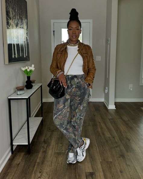 ~Recap of the OOTD~ Camo season! Swipe to see the look styled with sneakers as well. Watch the previous reel for step by step details! 🤎🍂🍁🍃🌳 . 📌Shop the look on my @shop.ltk page linked in my bio. . ✨What I’m wearing: *Leather jacket: @freepeople *Tank top: @macys *Pants: @abercrombie. These are men’s pants. I’m wearing a size 32x32. They’re linked on my LTK. *Purse: @balenciaga *Necklaces and bracelets: @imanijewelryco *Earrings: @etsy *Heels: @aldo_shoes *Sneakers: @asics via @stockx ... Sweater With Sneakers Outfit, Camo Pants Sneakers, Camouflage Wide Leg Pants For Streetwear, Wide Cargo Pants Outfit, Wide Leg Camouflage Pants For Streetwear, Casual Outfits With Sneakers, How To Style Camo Joggers, Style Camo Pants, Camouflage Wide-leg Cargo Pants For Streetwear