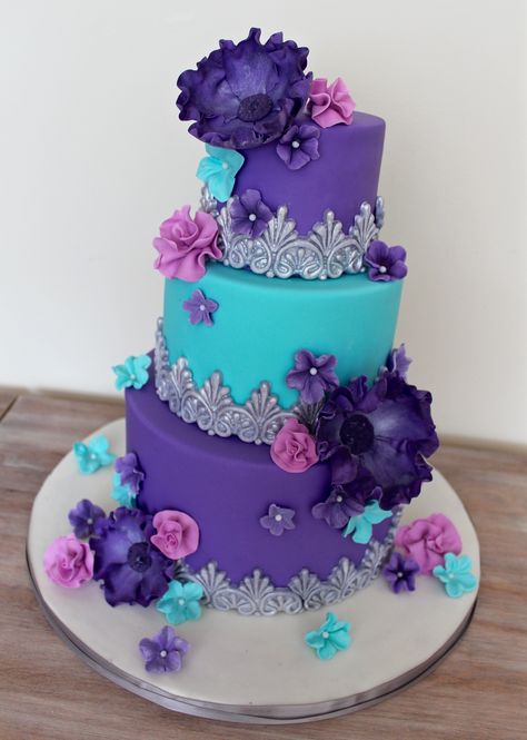 Whimsical purple turquoise and pink cake with silver. Fantasy sugar flowers Turquoise Wedding Cake, Purple Wedding Cake, Purple Cakes Birthday, Cowboy Cakes, Skull Cake, Purple Cakes, Sweet 16 Cakes, Turquoise And Pink, Birthday Cakes For Women