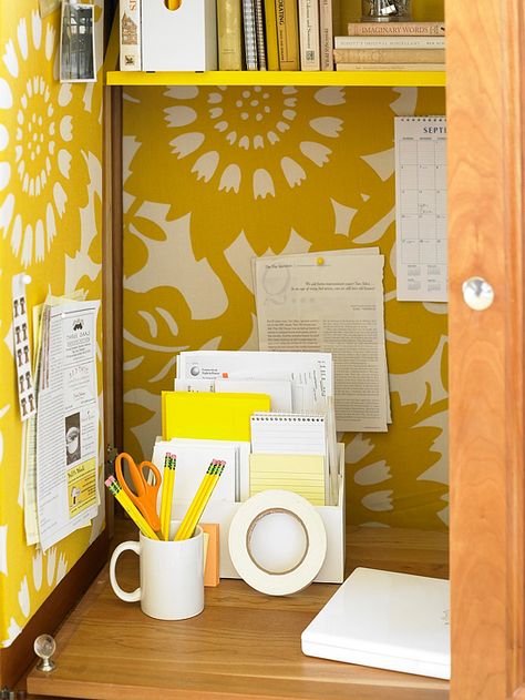 Decorative fabric creates an attractive backdrop when a bland space needs a makeover. A splash of sunny yellow helped transform this once-boxy armoire into a standout workstation. Cut corkboard panels to size and cover with fun patterned fabric. Mount the corkboard on the armoire's back wall and inner doors for a practical place to hang your calendar, stamps, and reminders. Desk Armoire, Office Armoire, Organized Desk, Armoire Desk, Cabinet Hutch, Armoire Cabinet, Craft Cabinet, Colorful Storage, Diy Furniture Bedroom