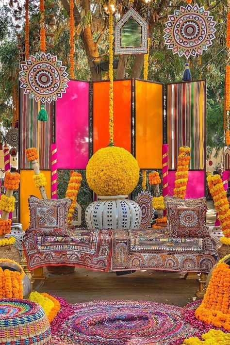 Colorful mehndi decor with marigold Mehndi Decoration Ideas At Home Mehendi, Mehndi Function Decoration, Mehendi Pictures, Mehndi Decor At Home, Mehndi Decoration Ideas At Home, Mehndi Setup, Trending Mehendi, Mehndi Decoration Ideas, Mehndi Decoration