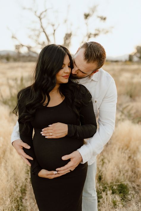 Maternity photoshoot outfit idea Maternity Session Black Dress, Maternity Photography Mens Outfit, Pregnant Fall Wedding Guest Outfit, Black Long Sleeve Maternity Dress, Simple Maternity Pictures Outdoor, Maternity Pictures Poses Couple, Christmas Maternity Pictures Couple, Plaid Maternity Photos, Maternity Pics Outside