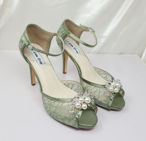 "Sage Green Lace Wedding Shoes. Lace Bridal shoes available in over 100 additional colors, including white and ivory.  We can also color match a sample you send us.  The shoes in the listing have been dyed Sage Green.  If you would like another color from my chart, a designer color or sending me a swatch, please pick from the dye color drop down menu and then let me know the color you would like in the \"note to seller\" area you will find during checkout. These beautiful satin and lace wedding Enchanted Forest Wedding Shoes, Sage Green Wedding Heels, Enchanted Forest Shoes, Sage Green Quinceanera Shoes, Sage Green Heels Prom, Forest Wedding Shoes, Whimsical Heels, Green Wedding Heels, Sage Green Quinceanera Theme