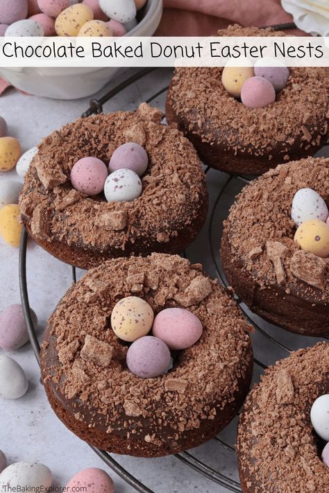 Recipe for Chocolate Baked Donut Easter Nests with mini eggs! Perfect chocolate treats for Easter, easy to make and decorate #thebakingexplorer #bakeddonuts #easterbaking #chocolatedonuts #minieggs Treats For Easter, Chocolate Donuts Baked, Chocolate Easter Cake, Baked Donut, Chocolate Loaf Cake, Baked Donut Recipes, Easter Nests, Mini Egg, Easter Baking