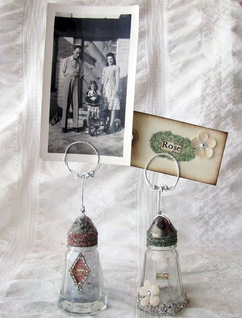 Use these vintage-look saltshakers to hold name cards or to display family photos on your tables.#Weddings Glass Salt And Pepper Shakers, Stepping Stones Diy, Salt Shakers, Display Family Photos, Spring Garden Flowers, Picture Holders, Vintage Wedding Decorations, Wedding Reception Tables, Salt Shaker