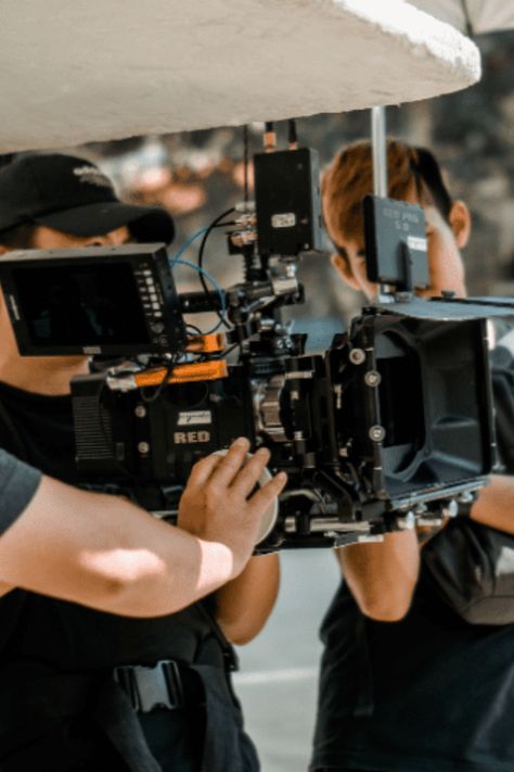 Film crew with camera Production Set Film, Movie Production Studio, Film Producer Aesthetic, Film Production Aesthetic, Film Maker Aesthetic, A24 Stills, Film Making Aesthetic, Filming Documentary, Filmmaker Aesthetic