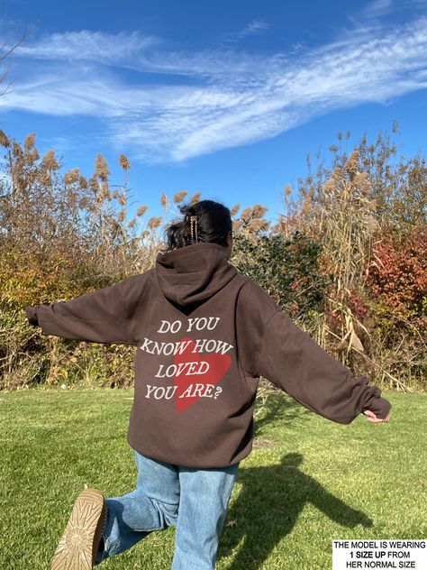 We are loving our latest Christian Hoodie! It's giving total Christian Aesthetic Trendy Vibes! We love that this is a unisex style & can work great for a men's Christian Hoodie & Is a great gift! See the rest of our christian collection here! - https://www.etsy.com/shop/StudioAMARIE?ref=shop-header-name&listing_id=948312516§ion_id=44846198 This hoodie is so cozy that you won't want to take off! Cute, comfortable and trendy -- a necessity for any aesthetic clothing collection! The material is the Christian Clothes Aesthetic, Cute Christian Hoodies, Christian Streetwear Fashion, Brown Hoodie Aesthetic, Christian Hoodies Aesthetic, Jesus Merch Aesthetic, Sweat Aesthetic, Bible Hoodies, Seek Jesus Hoodie