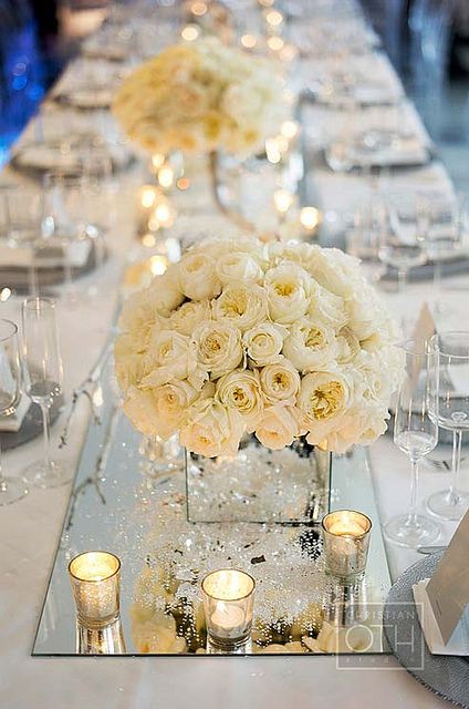 Some of the tables will have mirrored vases with white hydrangeas surrounded by silver mercury glass votives. Candles And Flowers, Flowers And Candles, White Weddings Reception, Tafel Decor, Wedding Floral Centerpieces, Wedding Reception Inspiration, בר מצווה, Wedding Table Decorations, Mod Wedding