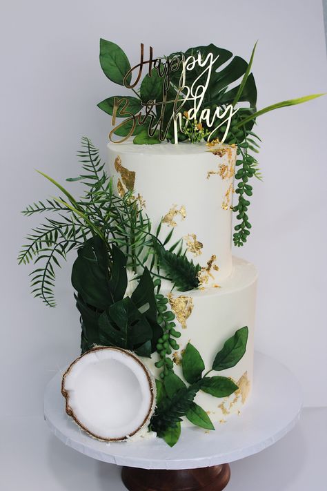 All white cake, green and gold details Leaf Birthday Theme, Tulum Cake Ideas, Coconut Theme Cake, Birthday Cake Tropical Theme, Plant Theme Cake Ideas, Birthday Cake Plants Theme, Greenery Birthday Cake, Coconut Themed Party, Botanical Birthday Cake