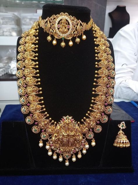 Pin by virat g on mango haram in 2022 | Bridal gold jewellery designs, Gold wedding jewelry necklace, New gold jewellery designs Lakshmi Bottu Mala Jewellery Designs, Heavy Long Haram Designs Gold, Bottumala Haram, Bottumala Designs, Bottu Mala Designs, Long Haram Gold Jewellery Designs, Gold Wedding Jewelry Necklace, Bottu Mala, Wedding Jewelry Necklace