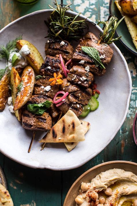 Greek Lamb Souvlaki Plates with Avocado Tzatziki. - Half Baked Harvest Avocado Tzatziki, Lamb Souvlaki, Greek Lamb, Lamb Skewers, Tzatziki Recipes, Lamb Dishes, Skewer Recipes, Grilled Lamb, Kebab Recipes