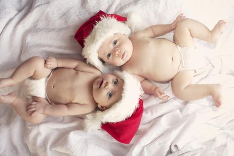 Christmas picture of the twins. Taken in our house, using natural light and a white comforter. Twins First Christmas Pictures, Twins Monthly Photo Ideas, Twin Baby Christmas Photos, Twins Christmas Pictures, Twins Christmas Photos, Newborn Twins Christmas Pictures, Newborn Twin Christmas Photos, Twin Holiday Photos, Twin Christmas Pictures