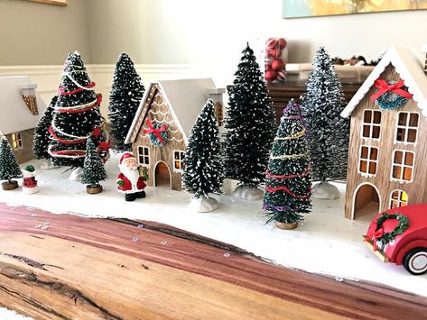 Here's a fun Modern Farmhouse Christmas Village Display you can use as a Table Centerpiece, on a buffet, or even your hearth. I used cheap and pretty easy to find ornament and crafting supplies to make this pretty Christmas Village. BUT, you don't need to use exactly what I have. Look through the ornaments and decorations you already have to see if you can use them in a NEW WAY to create your own Modern Farmhouse Christmas Village. :) Here's how I did it... Watch this video to se… Diy Red Truck, Diy Christmas Village Displays, Christmas Table Centerpiece, Diy Christmas Table, Pottery Barn Christmas, Diy Christmas Garland, Farmhouse Flair, Diy Christmas Village, Buffalo Plaid Christmas Tree