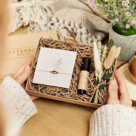 A perfect little wellbeing gift box to remind them to take time out for themselves.   Presented in a kraft and gold foiled gift box, our mini wellbeing gift set is the perfect way to show someone you're thinking of them 🥰  #giftforher #giftsforher #birthdaygiftsforher #pamperher #pampering #pamperingtime #pamperbox #treattime #treatbox Gift Set Photography, Gifts In A Box, Meditation Accessories, Thoughtful Gifts For Her, Gift Inspo, Gift Bracelet, Luxury Card, Treat Box, Guest Gifts