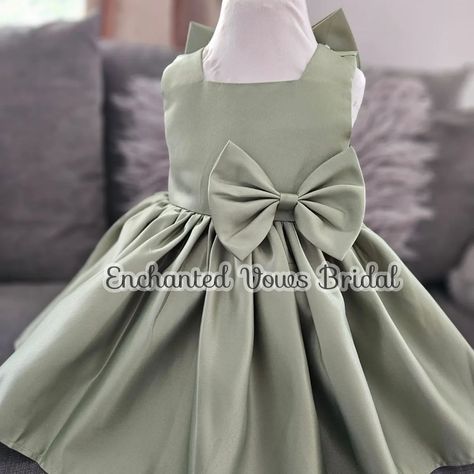 Gorgeous, Olive Green Satin Flower Girl Dress (Various Colours) - Wedding, Communion, Baptism, Party DressBridesmaid Dress - Wedding This beautiful Olive Green satin dress is available in a variety of colours. A simple but elegant dress in a satin feel fabric (polyester) with a bow on the front, and a large bow n the back that can detach. The back is zip up. #flowergirldress #flowergirl #olivedress #satindress #sagegreendtesd #partydress #birthdaydress #fyp #fypviral free #etsyshop #e... Olive Green Satin Dress, Wedding Communion, Green Satin Dress, Satin Flower Girl Dress, Princess Flower Girl Dresses, Olive Dress, Baptism Party, Custom Size Dresses, Satin Flowers