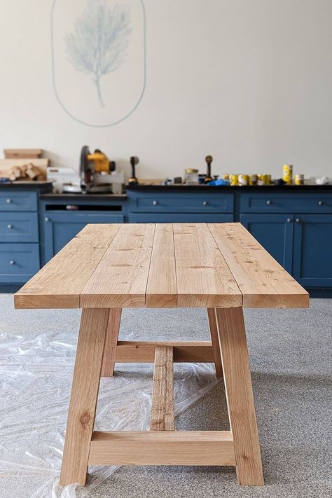 Looking for a chunky dining table that doesn't cost a fortune? Build one! We'll show you how to build this beautiful DIY table. It only requires a few steps and can be built in a day! Home Made Dining Table, How To Build Table, Rustic Dining Table Plans, A Frame Legs Table, Wooden Table Diy Dining, Dining Table Plan, Table Plans Diy, Build Your Own Table, Diy Farmhouse Dining Room Table