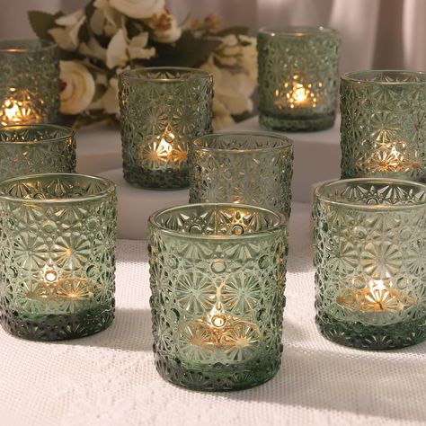 PRICES MAY VARY. ❤️Perfect Green Candleholders Decoration：Use this green candle holder at your wedding or dining table, When lit, it emits a charming and romantic light, illuminating the entire room with warmth.Votive candle holder with romantic floral pattern. It is especially suitable for summer lawn weddings and various celebration theme parties. ❤️Green Votive Candle Holders-Perfect for Vintage Home Decor and Green Wedding Theme Parties: This glass votive candle holder with unique floral pat Flower Candle Table Decorations, Green And Gold Wedding Shower Decor, Tree Party Decorations, Green Flowers Centerpiece, Enchanted Forest Wedding Welcome Sign, Wedding Sign In Table Decor, Simple Green Table Decor, Light Green Wedding Decor, Inexpensive Wedding Table Centerpieces