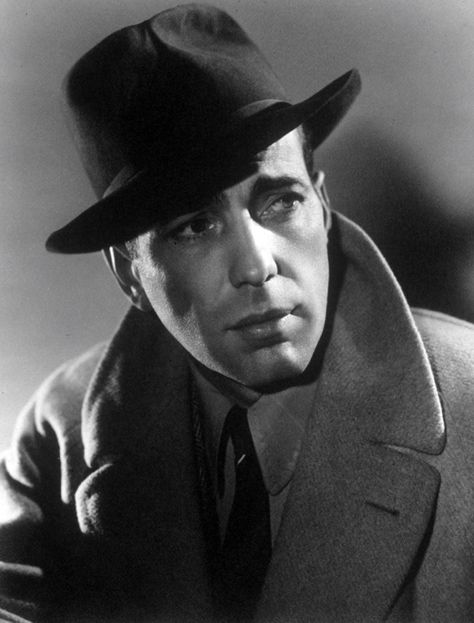 All men of mystery wear their collars up. Before Cumberbatch and the Belstaff coat, there was Bogart in his camel coat. Casablanca (1942). Humphrey Bogart, Wearing A Hat, Casablanca, A Man, Black And White, White, Black