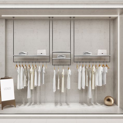 Need to make the most of your retail store's storage space? Look no further than our sleek and modern Ceiling Mounted Clothes Rack! Our rack is designed to give your inventory the attention it deserves, with multiple rods for hanging your clothing, accessories, and more. Plus, it's a great way to save space and display your inventory. So, maximize your retail store's storage space with our sleek and modern Ceiling Mounted Clothes Rack. #storage #retail #sleek #modern #ceilingmounted Ceiling Mounted Clothes Rack, Abaya Store, Ceiling Shelves, Project Architecture, Clothing Store Displays, Hanging Clothes Racks, Open Closet, Hanging Display, Clothing Displays