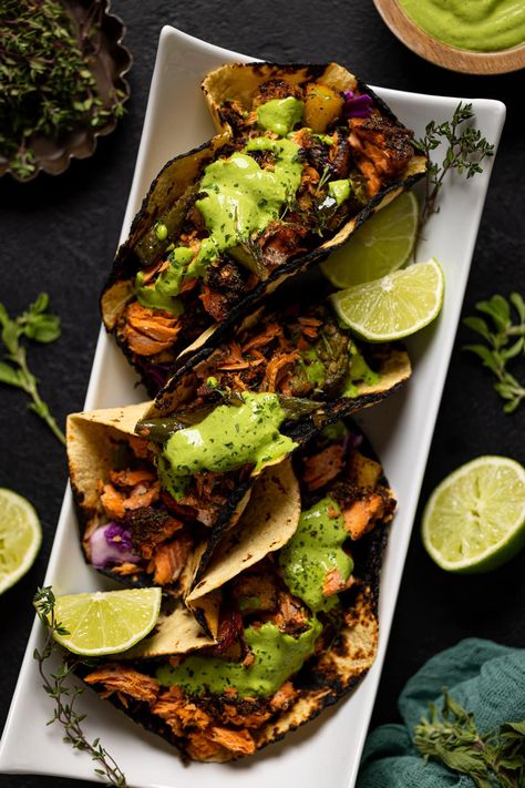 Jerk Salmon Tacos + Avocado Cilantro Lime Sauce | Simple Healthy Recipes, Complex Flavors | Orchids + Sweet Tea Jamaican Jerk Salmon, Crispy Salmon Tacos, Cajun Fish Tacos, Jerk Fish Tacos, Jerk Salmon Tacos, Jamaican Tacos, Jerk Salmon Recipe, Mexican Salmon, Salmon Fish Tacos