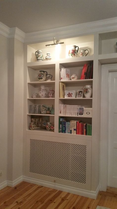 Built Ins Around Air Return, Radiator Cover Bookcase, Radiator Bookshelf, Radiator Cover Ideas, Living Room Storage Wall, Wall Radiators, Dining Room Built In, Floor To Ceiling Bookshelves, Living Room Panelling