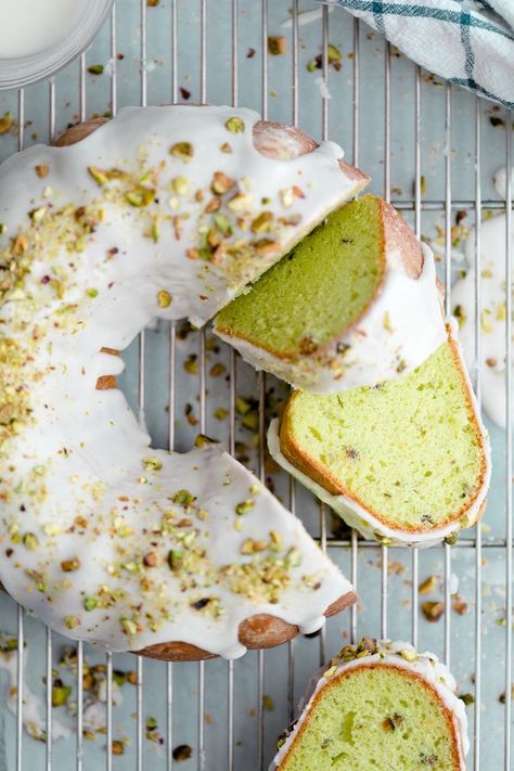 Easiest bundt cake recipe! This pretty green pistachio pudding cake is unfailingly soft and tender, studded with chopped pistachios, and glazed with a sweet and shiny white icing. It's an embarrassingly easy cake recipe to bake.   #baking #desserts #cake #AndieMitchell Pistachio Pudding Cake, Easy Bundt Cake Recipes, Easy Cake Recipe, Easy Bundt Cake, Baking Treats, Bundt Cake Recipe, Pistachio Pudding, Vegan Cakes, Pistachio Cake