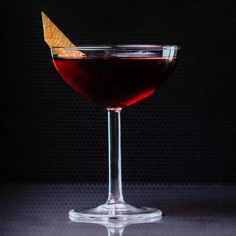 Part Manhattan and part Martini, the Martinez has appeared in cocktail books going all the way back to 1884. The recipe that most resembles the one served today comes from legendary bartender Jerry Thomas and includes Old Tom gin, a sweeter take on the juniper spirit. The story goes that Thomas himself might have invented the cocktail for a customer traveling to the port city of Martinez, Calif. Martinez Drink, Martinez Cocktail, Popular Alcoholic Drinks, Grape Brandy, Homemade Liquors, Cream Drinks, Cocktail Gin, Bar Cocktails, Cocktail Drinks Alcoholic