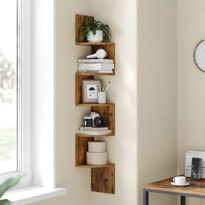 Made from high-quality materials, each of the five shelves supports up to 13.2 lbs, ideal for books, decor, or toiletries. Latitude Run® | Latitude Run® Corner Shelf Wall Mounted, 5-Level Floating Corner Bookshelf, Storage Display Shelf For Bedroom, Living Room, Bathroom | Wayfair Bookshelf For Corner Wall, Corner Shelves Living Room Modern, Tiny Room Storage Ideas, Corner Tree Bookshelf, Open Shelves Bedroom, Shelf Ideas For Bedroom, Wooden Room Decor, Corner Shelves Bedroom, Bookshelf In Bedroom