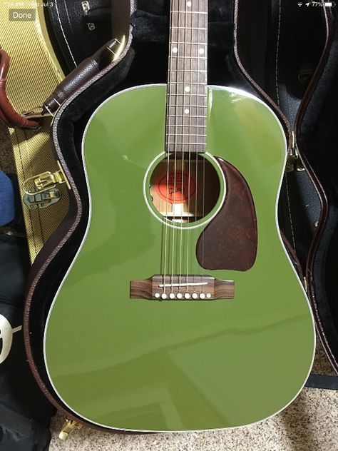 Gibson J-45 special edition in olive green Green Guitar Acoustic, Green Acoustic Guitar Aesthetic, Green Guitar Aesthetic, Green Guitar, Green Music, Dream Guitar, Guitar Classes, Pretty Guitars, Cool Electric Guitars