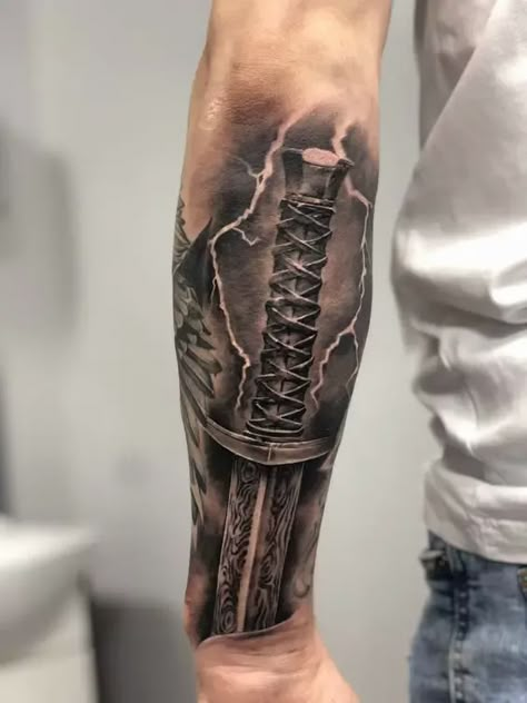 Forearm Tattoo Ideas for Men: Unique Sleeves & Small Designs Army Tattoos For Men, Forearm Tattoo Ideas For Men, Back Of Forearm Tattoo, Forearm Tattoos For Men, Egyptian Eye Tattoos, Half Sleeve Tattoos Forearm, Forearm Tattoo Ideas, Spartan Tattoo, Army Tattoos