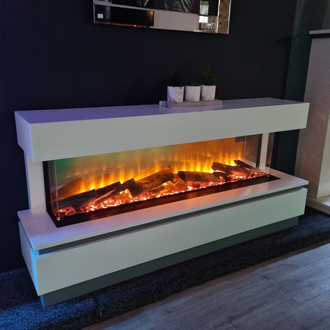 💎 The Empire Hang on the Wall Fire - on display now 💎 HUGE LOCAL SHOWROOM - visit today! This contemporary design comes in 2 sizes and features a bright white smooth finish with the trim and base finished in a light grey. Perfect for any modern home. 🔥 Up to 2kw heat output 🔥 1250mm + 750mm electric fire 🔥 Remote controlled 🔥 Fuelbed colour options 🔥 Dimmable lighting 🔥 Flame effects 💎 Go bespoke with a custom finish OUR SHOWROOM ✅ See before you buy ✅ Huge brick-and-mortar showroom ✅ 400+... Vapor Fireplace Living Rooms, Wall Fires, Latest Living Room Designs, Electric Fire, Electric Fires, Brick And Mortar, Hang On, Living Room With Fireplace, Interior Inspo