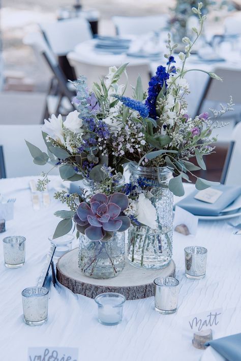 Wedding Centerpieces Diy Dusty Blue, Steel Blue Centerpieces Wedding, Blue Centrepiece Ideas, Blue Wedding Centerpieces Round Table, Simple Blue Centerpiece Wedding, Blue Rustic Wedding Theme, Rustic Blue Wedding Centerpieces, Simple Blue Flower Centerpieces, Wedding Centerpieces Green