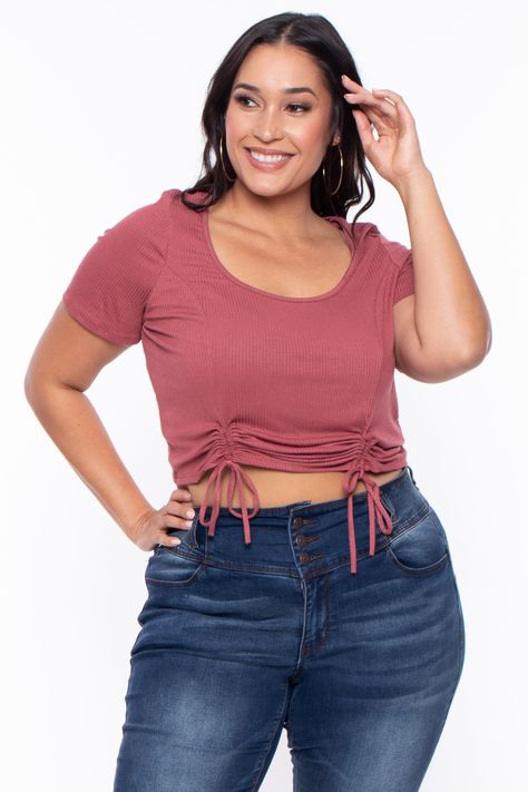 This plus size, stretch top features a crop top with a scoop neckline short sleeves, and front dual ruched hem detail that can be adjusted, this ribbed fabric is very comfy MADE IN USA Content + Care 95% Rayon And 5% Spandex Machine Wash Cold Model Measurement Wearing a Size 1X Height: 5'7" Bust: 39" Waist: 33" Hip: 45.5" Inseam: 31 Plus Size Crop Top Outfit, Plus Size Crop Top, Plus Size Crop Tops, Women Crop Top, Affordable Plus Size Clothing, Plus Size Brands, Ribbed Crop Top, Crop Top Outfits, Stretch Top