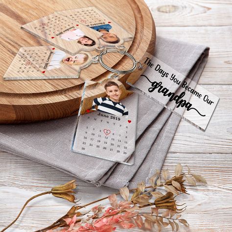 The Custom Photo Calendar "The Day You Became Our Dad Mom" Acrylic Tag Keychain is an extraordinary and heartfelt token of appreciation, ideal for any occasion. This unique product celebrates the special moments of becoming a parent, whether it's for fathers, mothers, grandpas, or grandmas. Crafted with precision and care, this keychain showcases a personalized calendar marked with the significant day when someone embraced the role of a parent or grandparent, making it an awesome and meaningful Custom Photo Calendar, Personalised Photo Gifts, Personalized Calendar, Personalized Acrylic, Photo Calendar, Personalized Photo Gifts, Simple Gifts, Personalized Keychain, Cherished Memories