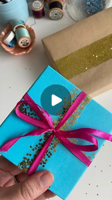 Emma West on Instagram: "Eco-friendly glitter, plastic-free tape and pops of colour- oh, my! 😍

Dare to be different with your gift wrapping- decorate gift boxes with unconventional things- the more fun you have wrapping the gift, the more impressive it’ll look! 

Plant based sellotape purchased on amazon 
Plant based glitter (plastic free!) from @eco_brd_ocean_safe 
Ribbon -repurposed from an old top 

#giftwrappingideas #giftwrappingskills #giftwrappinginspiration #plasticfreeliving #plasticfreelife #plasticfreeuk" Amazon Plant, Decorate Gift Boxes, Plastic Free Life, Plastic Free Living, Gift Wrapping Inspiration, Dare To Be Different, Be Different, Plastic Free, Gift Boxes