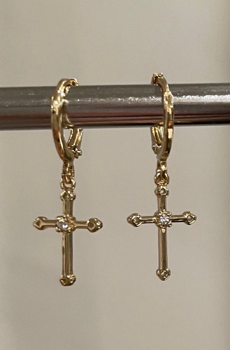 Beautiful dainty cross dangling earrings. 18K gold plated brass.  It is of great importance to me that I make jewelry for my customers that I, myself, wear every day. Each jewelry piece is handmade by me personally with love and care. Each item is crafted to the highest quality and made to exceed the expectations of my customers. My jewelry is designed to you to love and wear no matter what the occasion at an affordable price.  Jewelry is packaged in a velvet pouch and wrapped in tissue paper wh Cross Gold Earrings, Cross Dangle Earrings, Small Cross Earrings, Cross Gold Jewelry, Hrh Collection Jewellery, Gold Cross Jewelry, Cross Earrings Aesthetic, My Wishlist Ideas, Piercings Idea