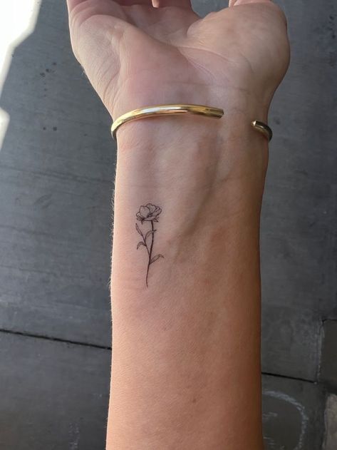 Short Inspirational Tattoos, Marigold Tiny Tattoo, Tattoo Ideas September Flower, Mom Dainty Tattoo, Fine Line August Flower Tattoo, Simple Marigold Flower Tattoo, For My Mom Tattoo Ideas, Fine Line Flower Tattoo Inner Arm, Small Back Flower Tattoo