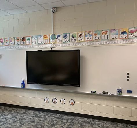 Fun Classroom Wall Decor Ideas for Above your Whiteboard 5 White Board Decoration Ideas, Classroom Clock, Teacher Chairs, Cinder Block Walls, Classroom Wall Decor, Classroom Hacks, Fridge Storage, Classroom Furniture, Cinder Block