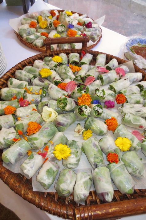 Asian summer rolls with edible flowers from Assaggiare Mendocino Asian Garden Party, Spring Roll Charcuterie Board, Asian Food Wedding Buffet, Asian Grazing Board, Asian Themed Charcuterie Board, Asian Catering Ideas, Asian Grazing Table, Asian Buffet Table Ideas, Thai Wedding Food