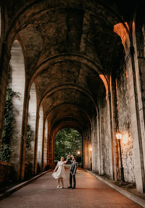 Fort Tryon Park Engagement Session in Manhattan NYC. In this blog you will be inspire by a newly engaged couple shooting their engagements under a bridge in New York. The best engagement session ideas for your summer engagement photo ideas. Fort Tryon Park Engagement, Met Cloisters Photoshoot, Engagement Photos Old Buildings, Bridge Photoshoot Photo Ideas, Pr Photoshoot, Engagement Spots, Engagement Photo Location Ideas, City Engagement Pictures, Fort Tryon Park