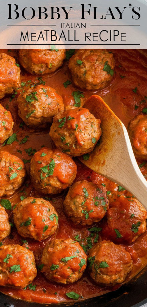 You’ll love Bobby Flay’s Italian Meatballs! Made with a flavorful mix of seasonings and simmered in a rich tomato sauce, they’re perfect over pasta or on their own. Italian Meatballs Recipe Authentic, Sicilian Meatballs Recipe, Bobby Flay Meatballs, Tomato Meatballs, Italian Meatball Recipes, Sicilian Meatballs, Authentic Italian Meatballs, Homemade Italian Meatballs, Meatballs In Tomato Sauce