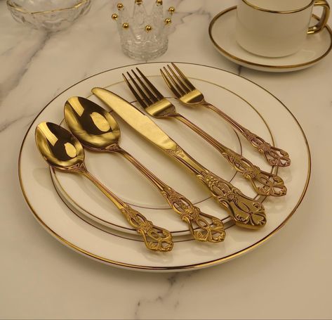 Gold utensils at a placesetting with vintage design to include two spoons, a knife and two forks across a small white plate with gold edges Polish Silverware, Fork Spoon Knife, Gold Silverware, Gold Cutlery Set, Gold Cutlery, Gold Flatware, Spoon Knife, Kitchen Utensil Set, Stainless Steel Flatware