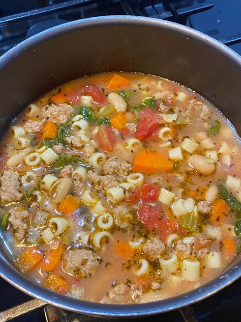 This hearty White Bean and Sausage soup is a comforting dish perfect for any season. Packed with protein from the Italian sausage and fiber from the cannellini beans, it’s both nutritious and filling. The blend of aromatic vegetables, herbs, and spices brings depth to the flavor, while the addition of pasta and spinach makes it […] White Bean And Italian Sausage Soup, Sausage Bean Spinach Soup, Italian Sausage Bean Soup, Italian Sausage And Beans, Pasta Bean Soup, Keilbasa Recipes Soup White Beans, White Bean Soup With Sausage, Ditalini Soup Recipes, Sausage Pasta Soup