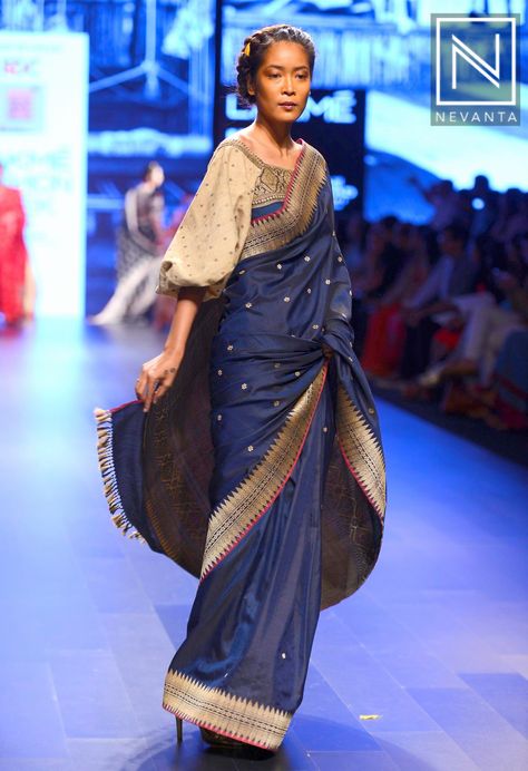 A navy tasseled #saree paired with a balloon sleeve blouse from #SumonaCouture Lakme Fashion Week 2016, Indian Closet, Stylish Saree, Desi Fits, Formal Saree, Embroidery Blouses, Blouse Ideas, Royalty Aesthetic, Indian Saree Blouse