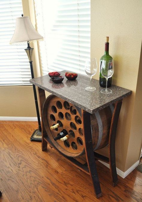 HOMEFURNITURE 8 Stunning Uses for Old Wine Barrels by Elise Moreau ADVERTISEMENT Table Wine Rack, Cave Vin, Wine Barrel Table, Party Decorations Table, Barrel Ideas, Built In Wine Rack, Barrel Projects, Wine Barrel Furniture, Barrel Bar