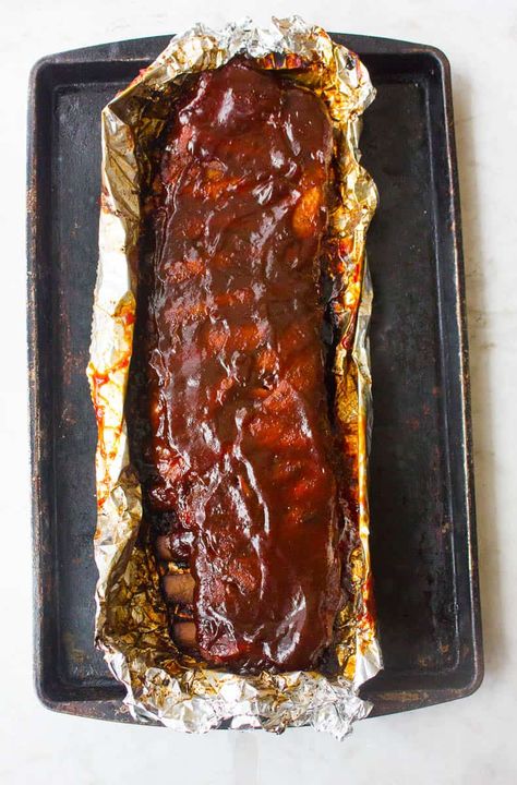 Savor the sweet and savory goodness of our irresistible Oven-Baked Brown Sugar Ribs! Tender, flavorful, and sticky, these ribs are the ultimate crowd-pleaser. #BrownSugarRibs #BBQRibs #OvenBakedRibs #RecipeIdeas #FoodieDelights Oven Baked Pork Ribs, Oven Pork Ribs, Baked Pork Ribs, Pork Ribs Recipe, Ribs In Oven, Oven Baked Ribs, Bbq Pork Ribs, Pork Rib Recipes, Baked Pork